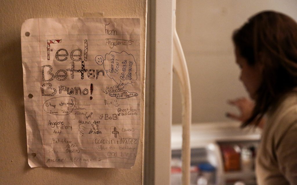 Words of support from Bruno Stillo's sister Angelene. Delgadillo says that having five people living in one small apartment is tough, but she relies on everyone to do their part in taking care of Bruno. (Scott McIntyre for Leafly)