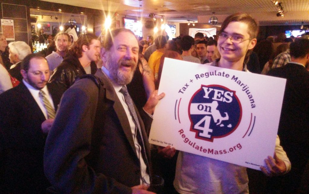 Bill Downing, owner of CBD Please in Allston, Mass., at a Boston Yes-on-4 viewing party. (Dan McCarthy for Leafly)