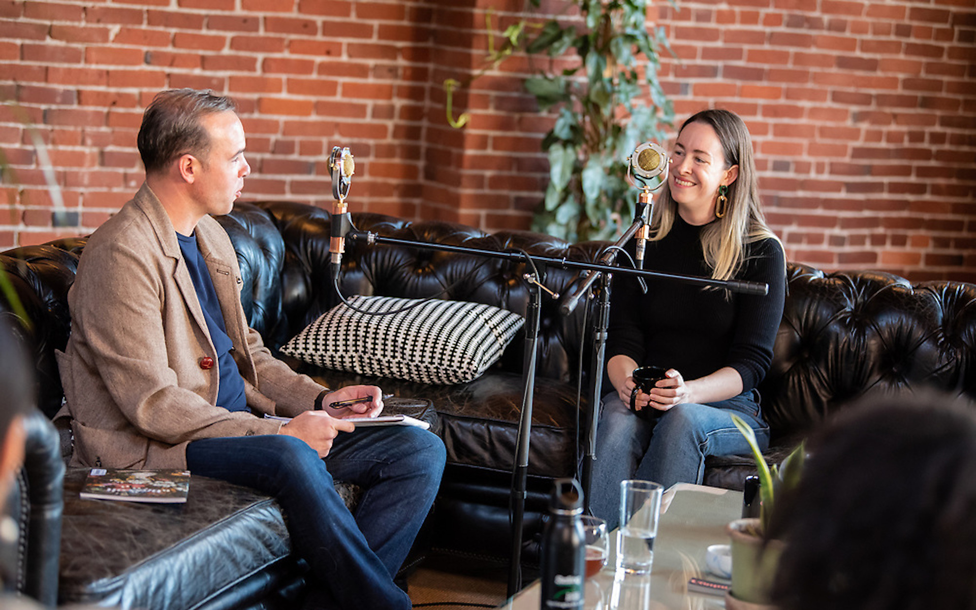 Broccoli founder Anja Charbonneau, with The Hash podcast co-host David Downs, at Listen Up Portland Feb. 17. (Photo by Casey Campbell | Courtesy Listen Up Portland)